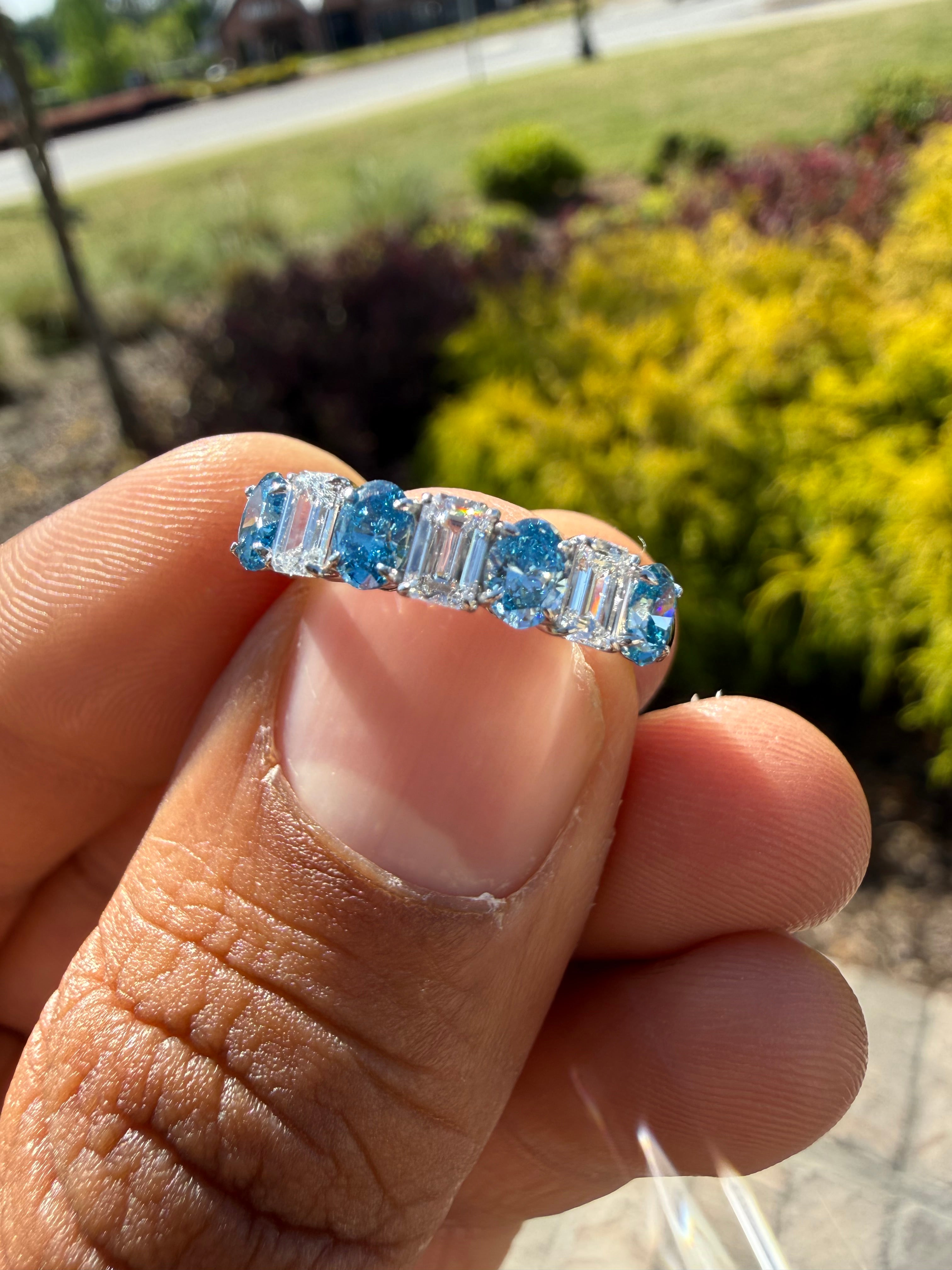 1.2carat fancy vivid blue oval  E vs and emerald cut handcrafted ring made with 14k gold in grown diamond