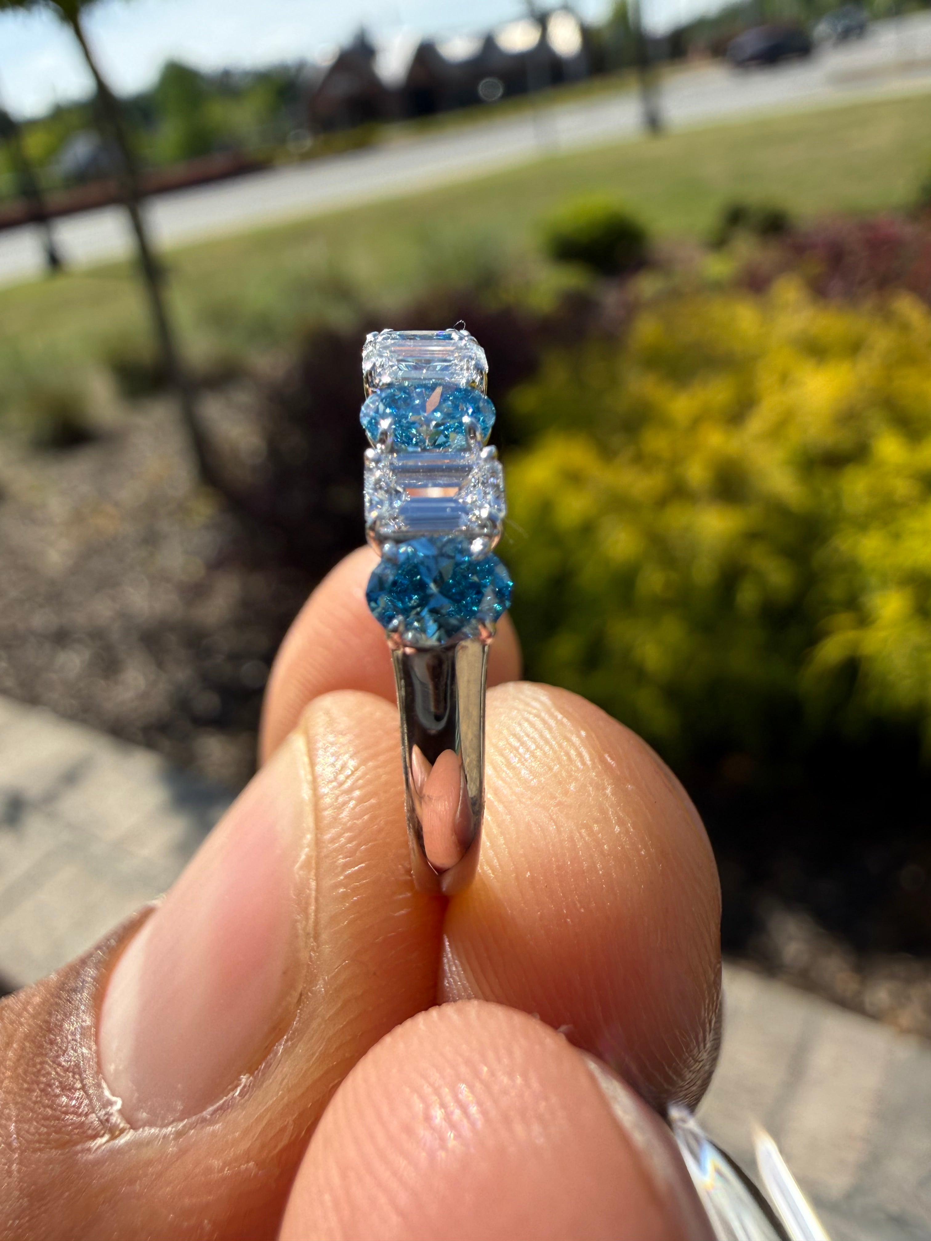 1.5 carat fancy vivid blue oval  E vs and emerald cut handcrafted ring made with 14k gold in grown diamond
