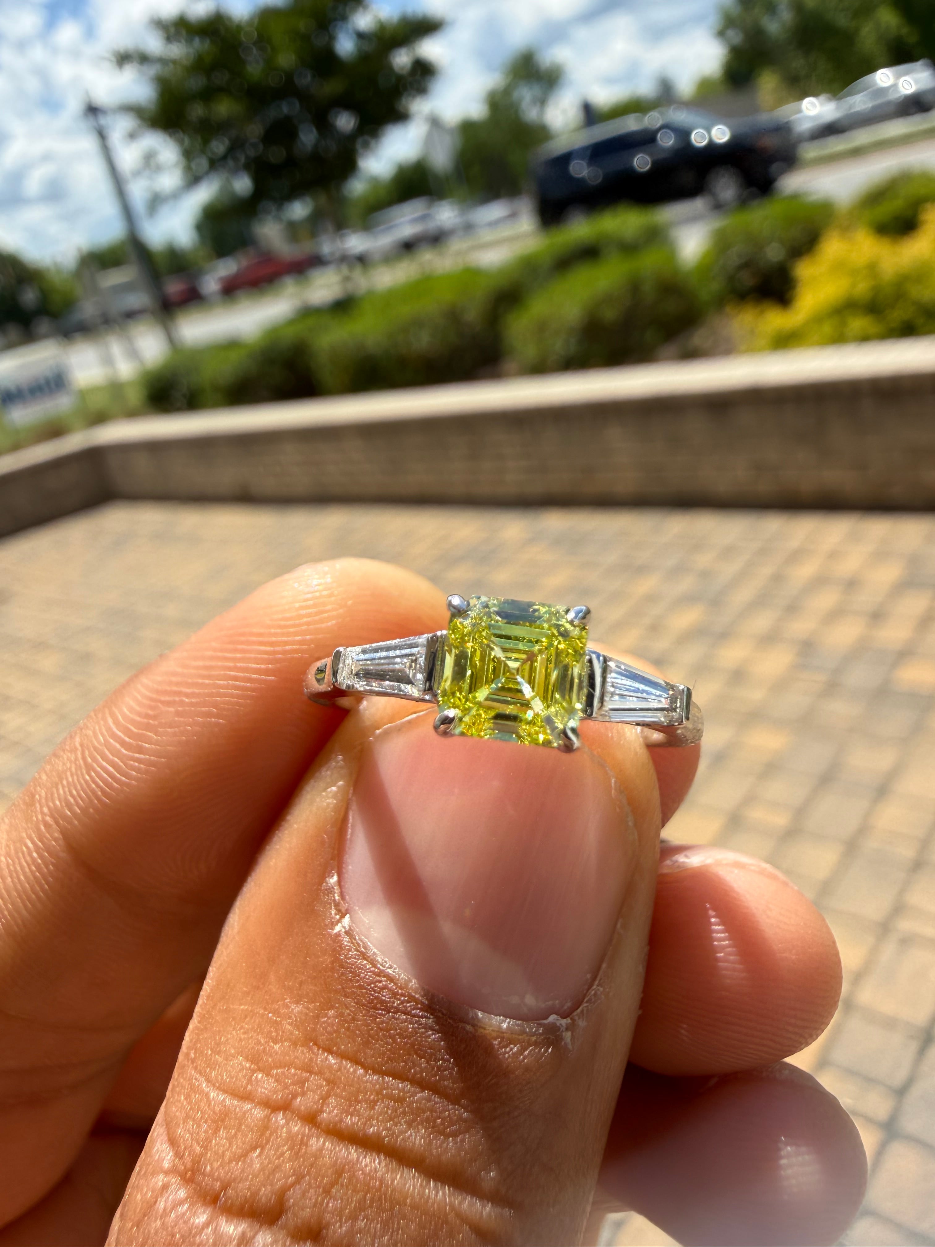 1.30 carat  fancy yellow emerald cut vs ring in fancy vivid yellow igi certified stone handcrafted in color high cut with  handcrafted ring made with 14k gold in grown diamond igi certified