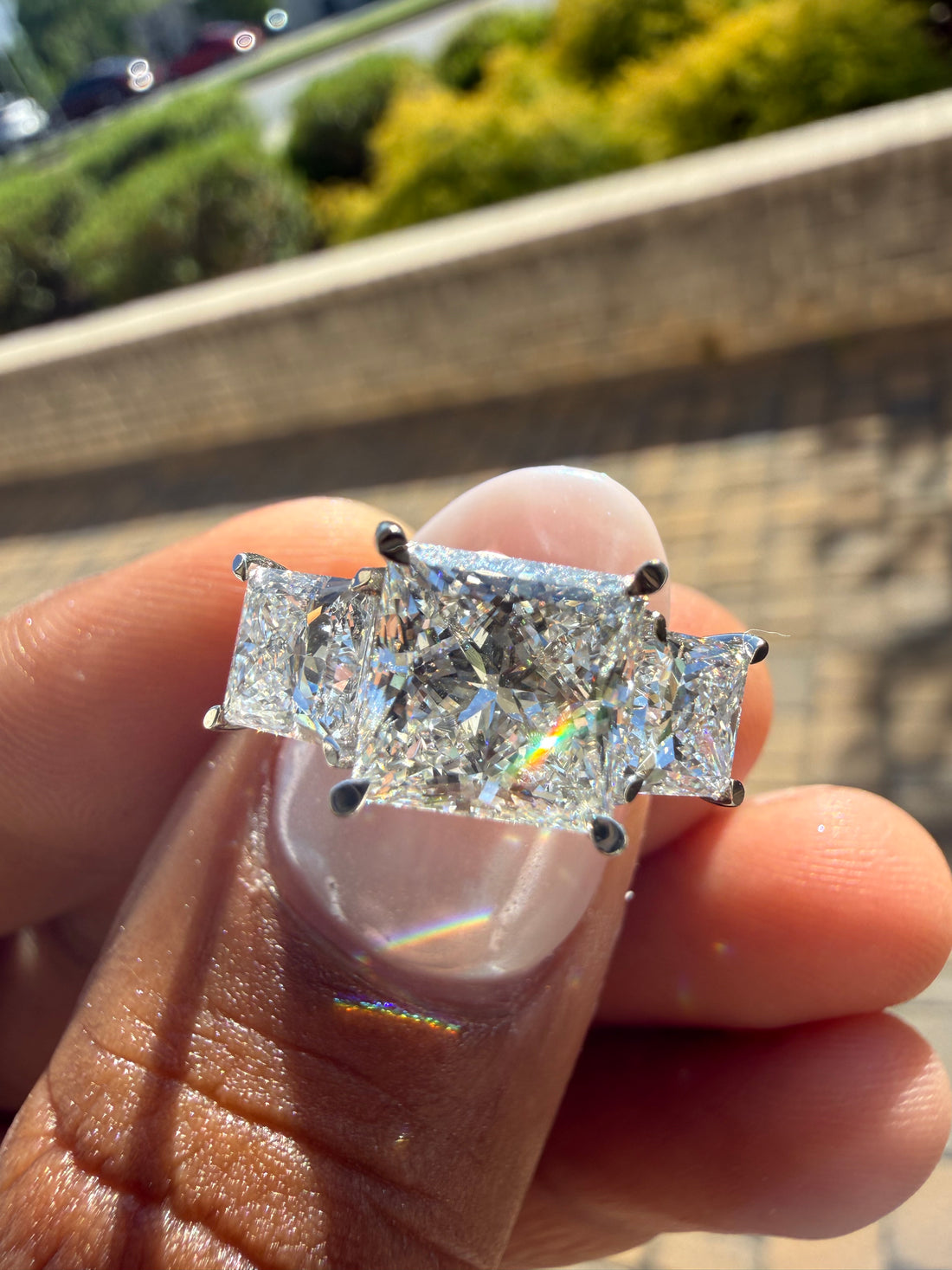 5 carat center princess  Cut with 3 carat center stones E vs igi certified with high cut on side made with high craftsmanship with round brilliance made in 14k gold)