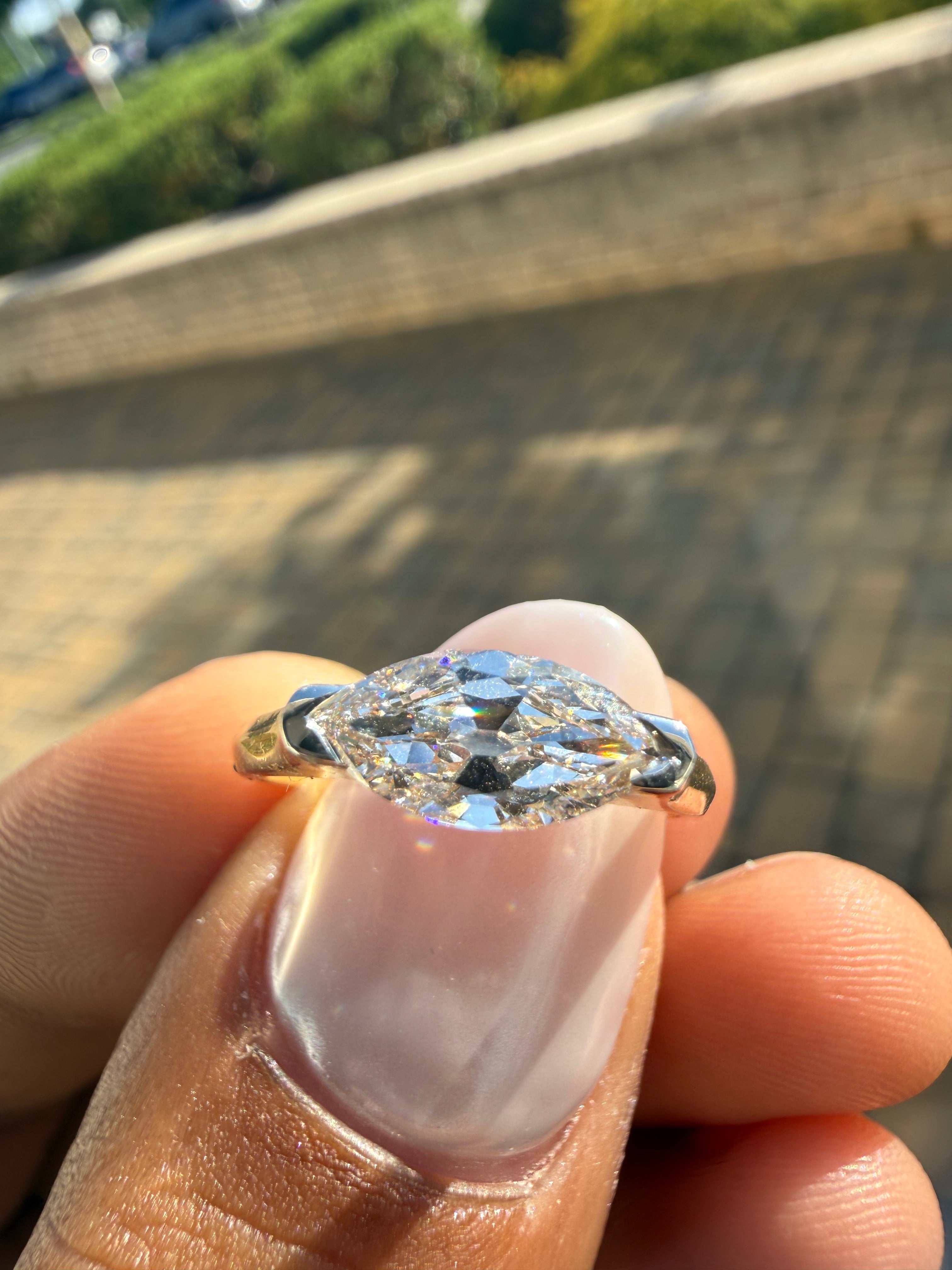 2 carat elongated oval special cut ring cut E vs IGI certified  stone with special cut on side stone highly handcrafted in grown diamond 14k gold
