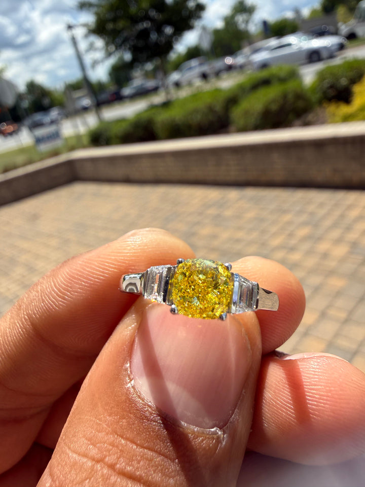 1.5 carat  cushion center stone fancy yellow emerald cut ring in fancy vivid yellow igi certified stone handcrafted in color high cut with  handcrafted ring made with 14k gold in grown diamond igi certified