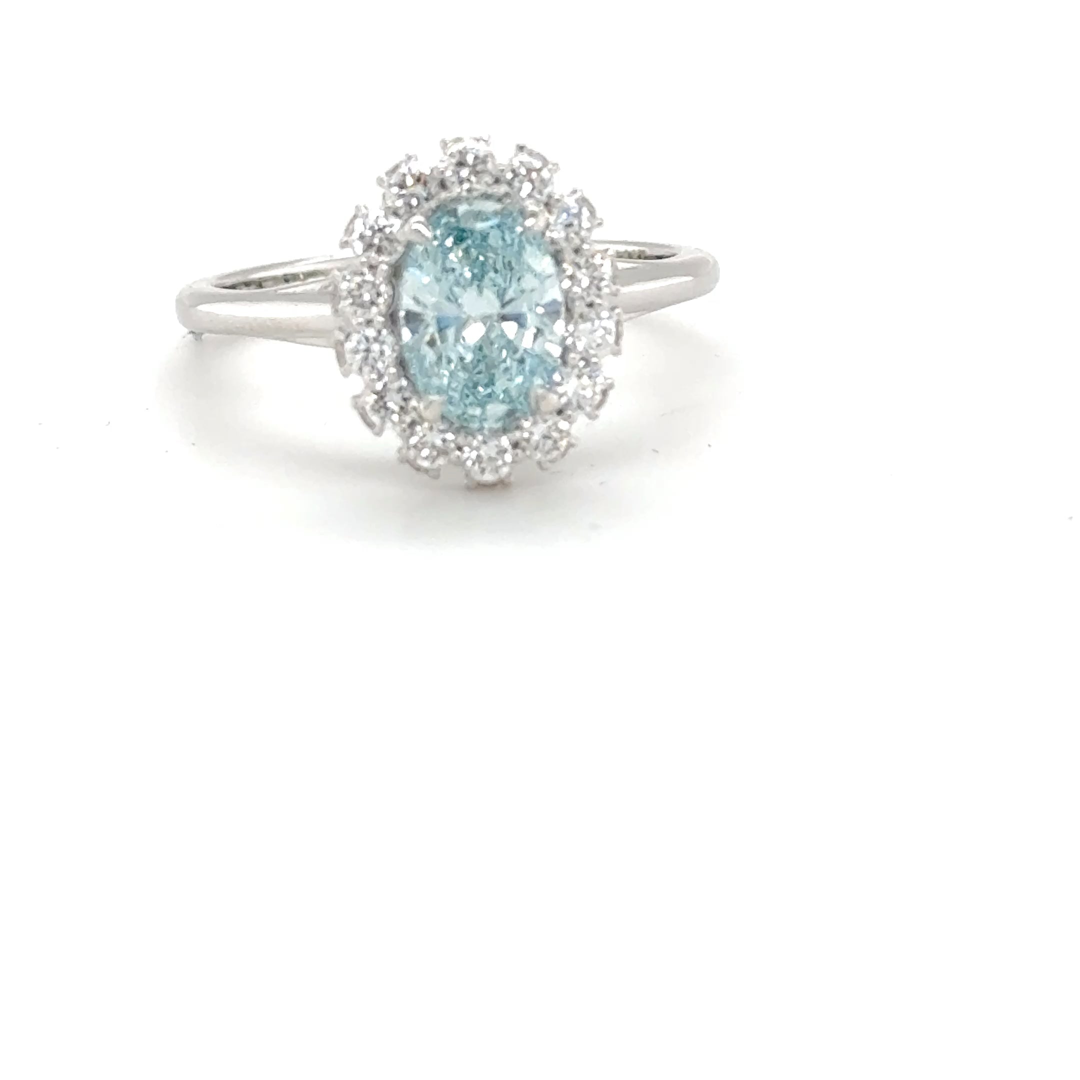 3 carat center fancy blue oval  E vs igi certified with high cut on side made with high craftsmanship with round brilliance ( made in 14k gold)