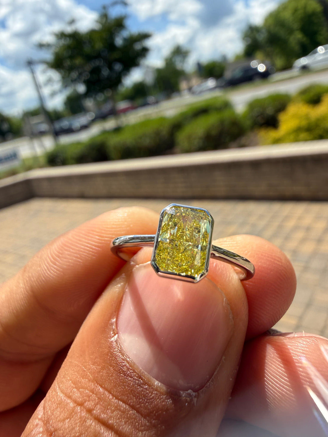 1.30 carat  fancy yellow emerald cut vs ring in fancy vivid yellow igi certified stone handcrafted in color high cut with  handcrafted ring made with 14k gold in grown diamond igi certified