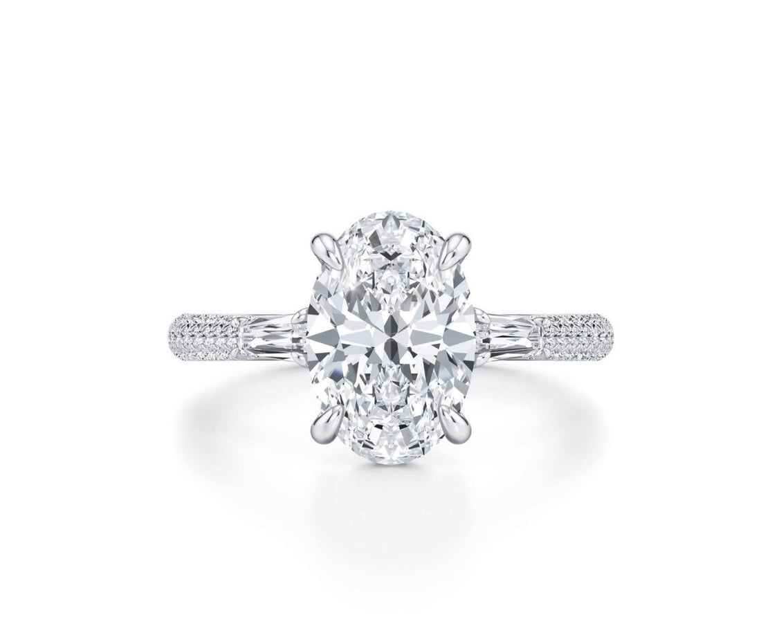 3 carat center oval E vs igi certified with French cut tapered baguettes on side made with high craftsmanship with round brilliance ( made in 14k gold)