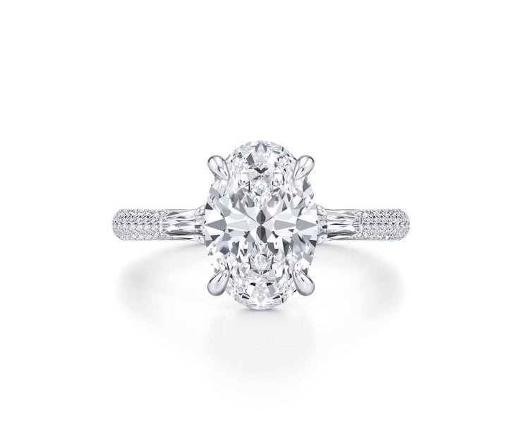 3 carat center oval E vs igi certified with French cut tapered baguettes on side made with high craftsmanship with round brilliance ( made in 14k gold)
