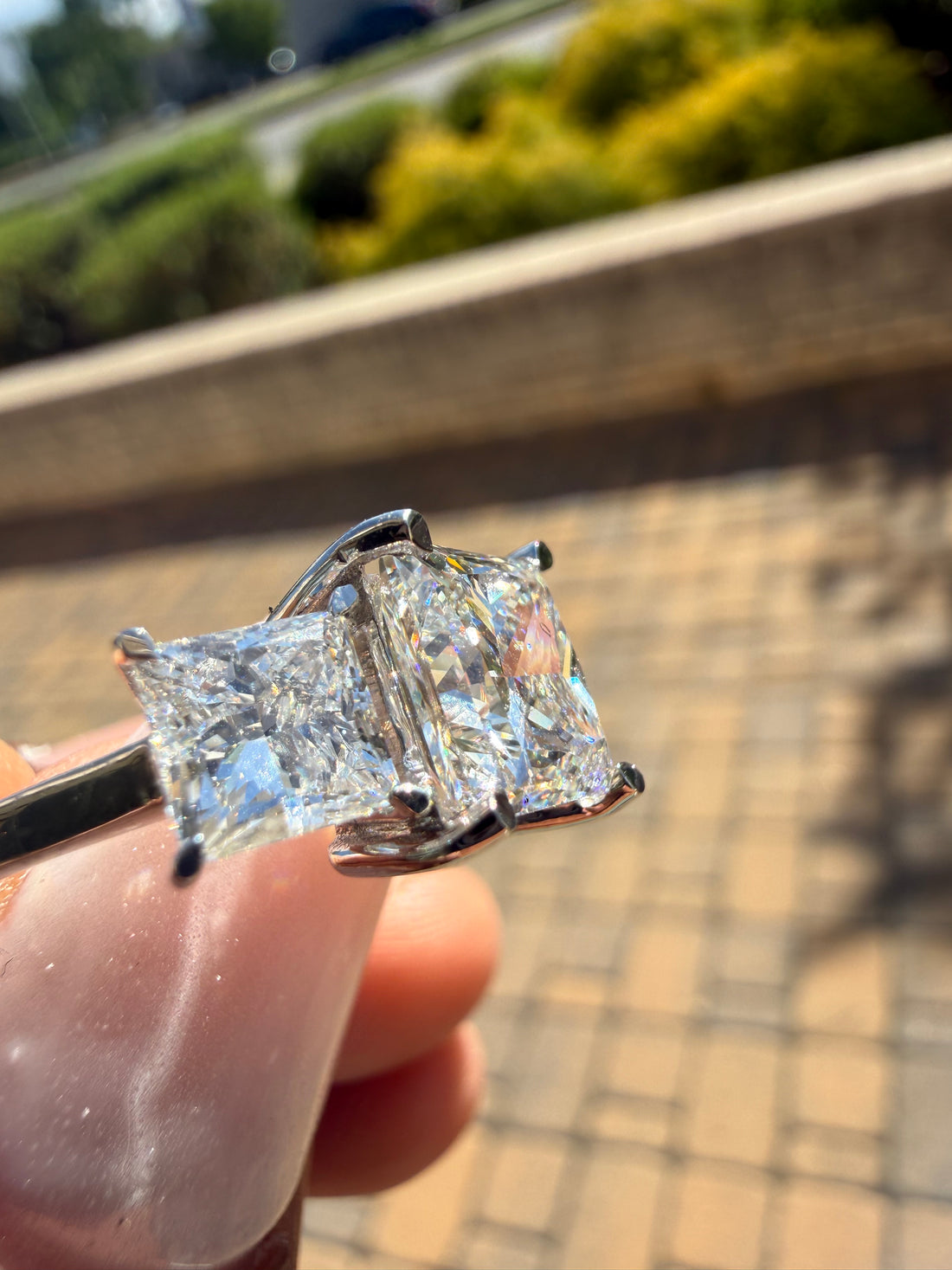 5 carat center princess  Cut with 3 carat center stones E vs igi certified with high cut on side made with high craftsmanship with round brilliance made in 14k gold)